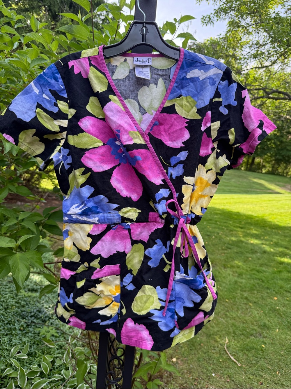 Simple Joys Floral Wrap Scrub Top in Black with Pink, Blue & Yellow size S